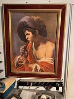 Full view of framed art on wall