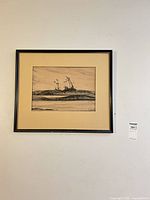 Full view of framed drawing on wall