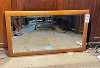 Front view of framed wall mirror