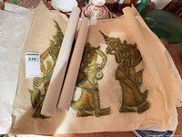 Rolled and unrolled tissue prints with Thai dancer imagery