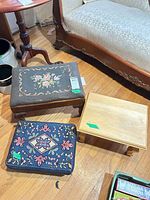 Group shot of all three footstools on wood floor