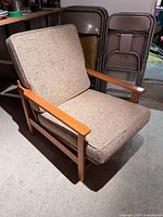 Front angled view showing frame, cushions, fabric