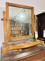 Front view of entire mirror on base