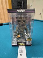 Front view of boxed Groot Hikari figure showing limited edition 5000 sticker