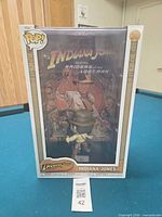 Front of sealed Funko Pop box showing Indiana Jones figure and Raiders of the Lost Ark artwork