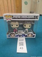 Front of Funko Pop! SNL Spartan Cheerleaders 2-pack in packaging