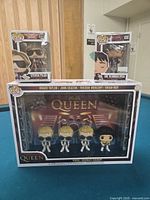 Overall view of three boxed Funko Pop figures