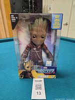 Front view of sealed Groot action figure in retail box