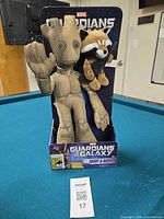 Front view of Groot and Rocket plush figures in original Guardians of the Galaxy box