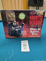 Front of sealed Polar Lights Haunted Manor model kit box