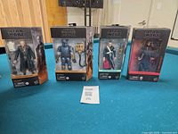 Group shot of four sealed Black Series figures