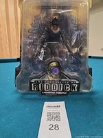 Front view packaged Lensing Necro figure