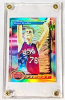 Front view of Shawn Bradley Topps Finest foil card inside screw-down case