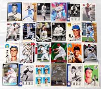 All 24 trading cards laid out in four rows of six