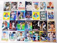 Overview of all 28 baseball cards laid out 4 × 7