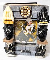 Front of album with Patrice Bergeron card and molded Bruins decorations