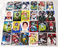 Overview of all 24 football cards laid out in four rows