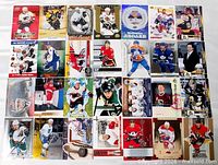 All 28 hockey cards laid out in five-row grid