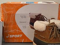 J Sport boots with box showing features