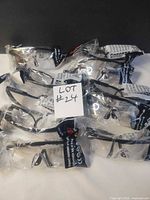 Six individually packaged Harden safety glasses displayed