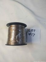 Side view of wire on black spool