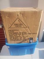 Closed master carton showing product labeling and quantity 144 pcs