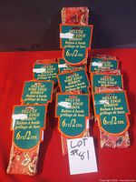 Lot of 10 packaged Deluxe wire edge ribbons displayed