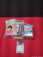 Three sealed ziplock bags of trading cards