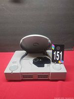 Console lid open showing disc drive mechanism