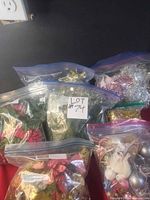 Overview of multiple ziplock bags containing assorted Christmas decorations