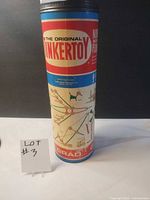 Front view of cylindrical Tinkertoy canister