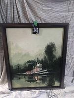 Front view of framed painting depicting tugboat