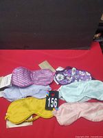 Six assorted Zara Home sleep masks laid out