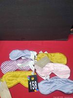 Six Zara Home sleep masks laid out to show colours and tags