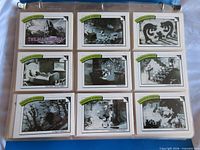 Binder page with nine black-and-white Disney "Favorite Stories" cards