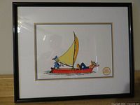 Front view of framed serigraph cel showing Donald Duck and Goofy in boat
