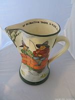 Frontal view showing anglers scene, spout, interior inscription