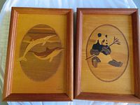 Both framed inlay pictures side by side