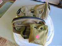 All three olive drab canvas bags grouped