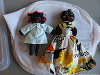Front view of both cloth dolls