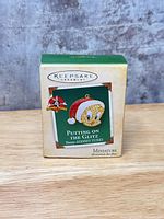 Front of original Hallmark Keepsake box showing Tweety Putting on the Glitz ornament image