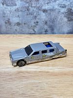 Left side view showing body color, decals, wheels