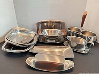 Group shot of all stainless steel serving pieces