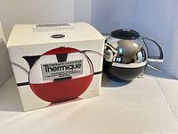 Thermal server beside original box