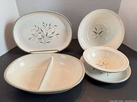 Front view of all eight Harkerware Stone China pieces displaying pattern and forms