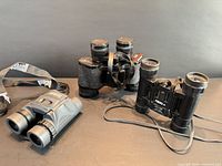 All three binoculars side by side