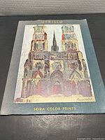 Front of blue Skira folder with Utrillo cathedral illustration