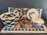 Group image showing baskets, ceramics, textile
