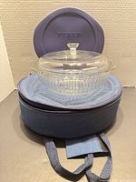 Casserole dish with lid in blue insulated carrier
