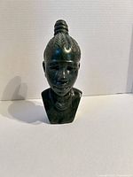 Front view of carved stone bust